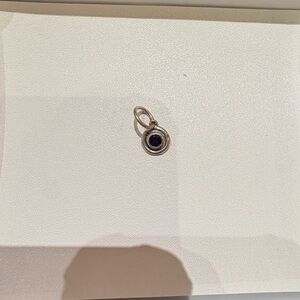 Waxing Poetic Sterling Silver Pendant with Dark Blue Stone